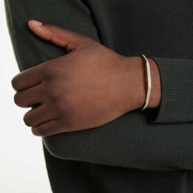 Dextera-armbånd, åttekantet form, rundslipt, hvit, gullfarget Dextera-armbånd, åttekantet form, rundslipt, hvit, gullfarget