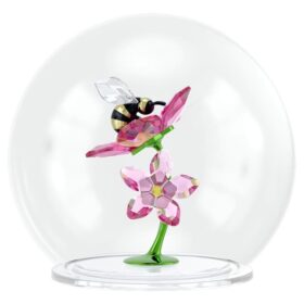 Idyllia glasskule med bie og blomster
