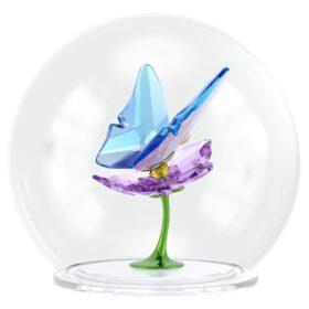 Idyllia glasskule med sommerfugl og blomst