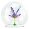 Idyllia glasskule med sommerfugl og blomst