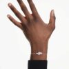 Matrix-armbånd med baguetteslipte steiner, knute, hvitt, rhodiumbelagt Matrix-armbånd med baguetteslipte steiner, knute, hvitt, rhodiumbelagt